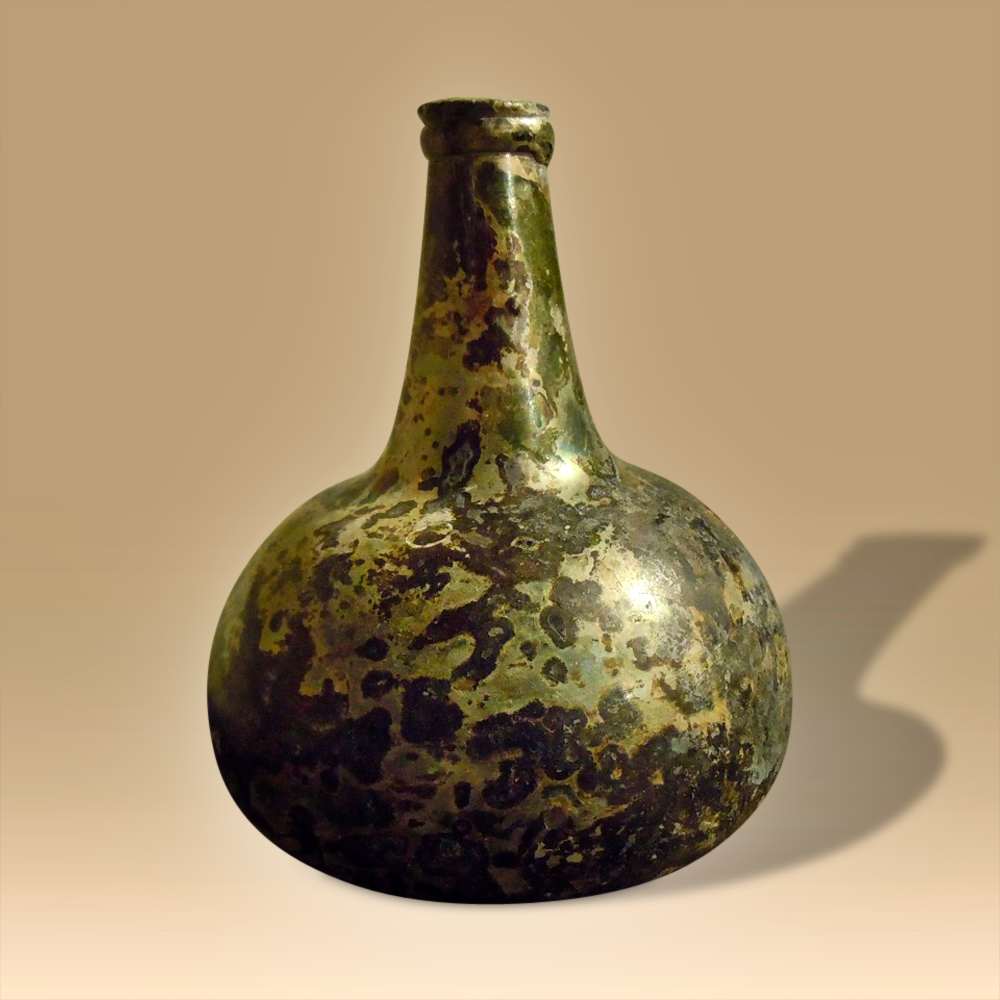 An Early Globe & Sack Bottle