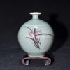 青釉兰花草纹水注/花插