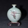 青釉兰花草纹水注/花插