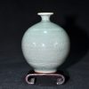 青釉兰花草纹水注/花插