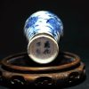 大明成化款 青花花卉纹铁锈边将军罐 （有残） - Image 10