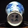 大明成化款 青花花卉纹铁锈边将军罐 （有残）