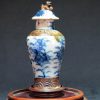 大明成化款 青花花卉纹铁锈边将军罐 （有残）