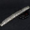 日本 錾银人物风景故事纹武士刀型臂搁