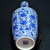 大清乾隆款 青花开光缠枝莲纹棒槌瓶